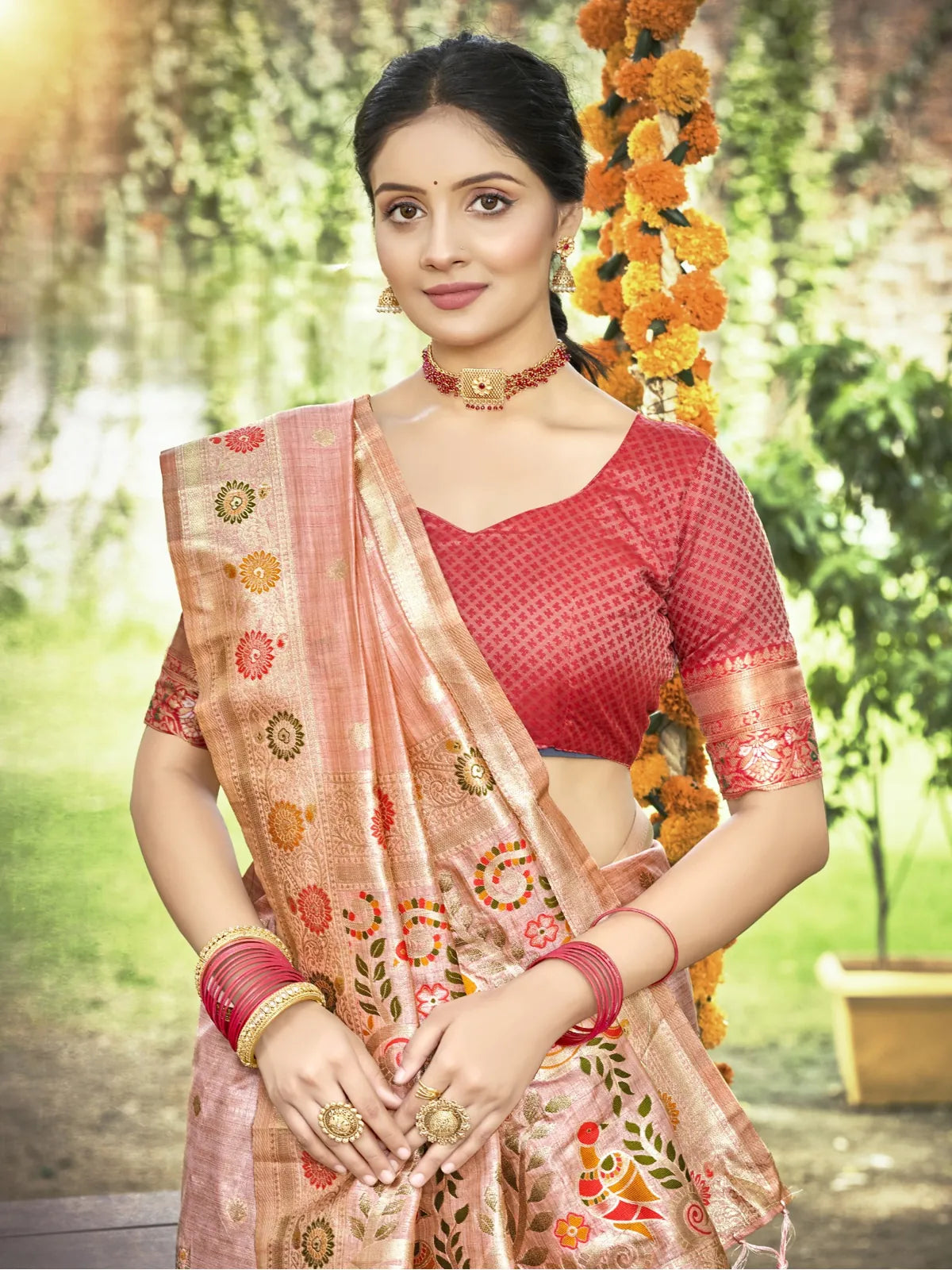 Tarani peach silk saree upper body view with red brocade blouse and delicate zari weaving