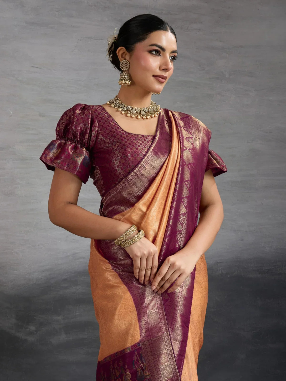Tarani peach Kanjivaram silk saree upper body view with brocade blouse