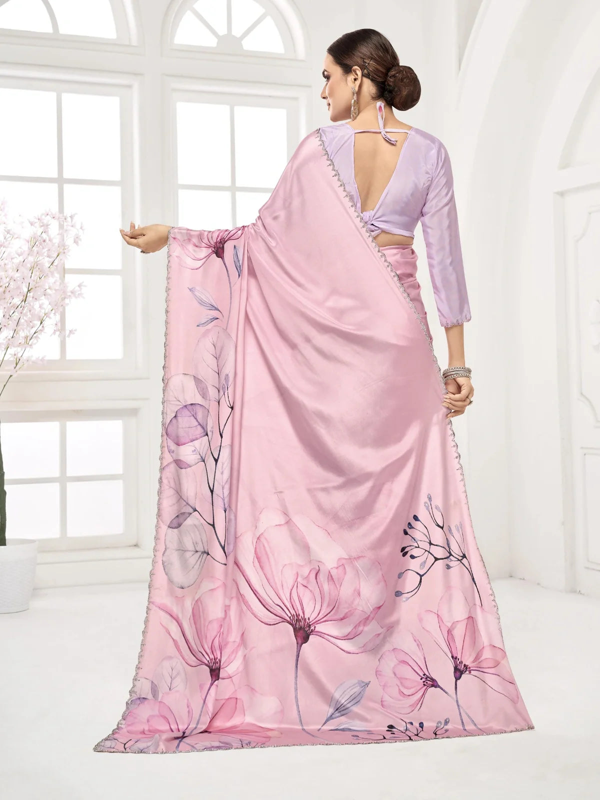 Tarani pink saree back view showing pallu fall and stylish lilac blouse design
