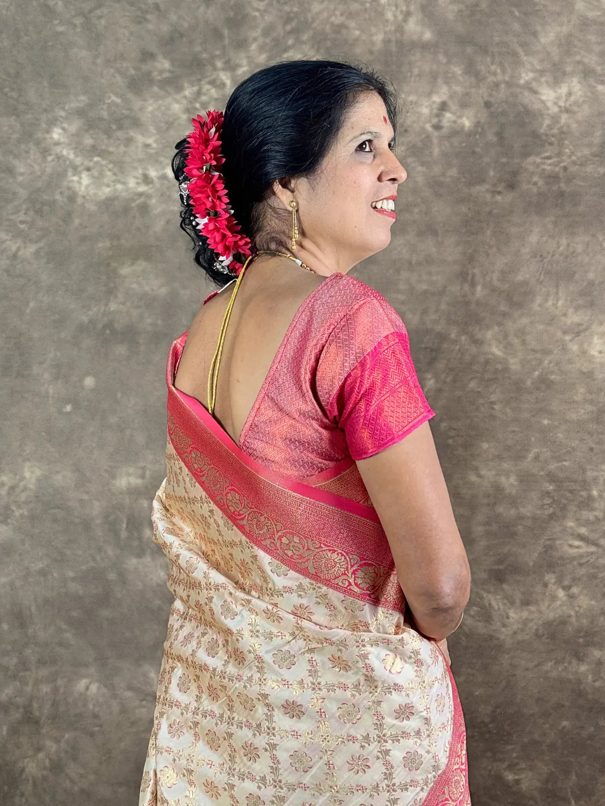 Tarani off white silk saree with pink blouse back view showcasing woven detail