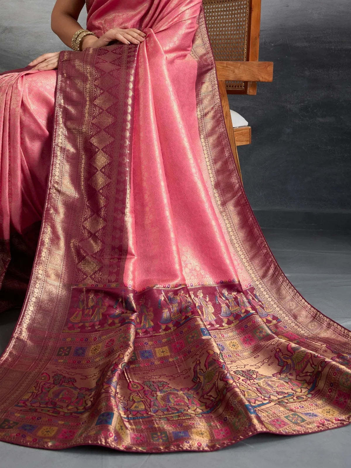 Tarani pink silk saree closeup view showing zari detailing and meenakari motifs