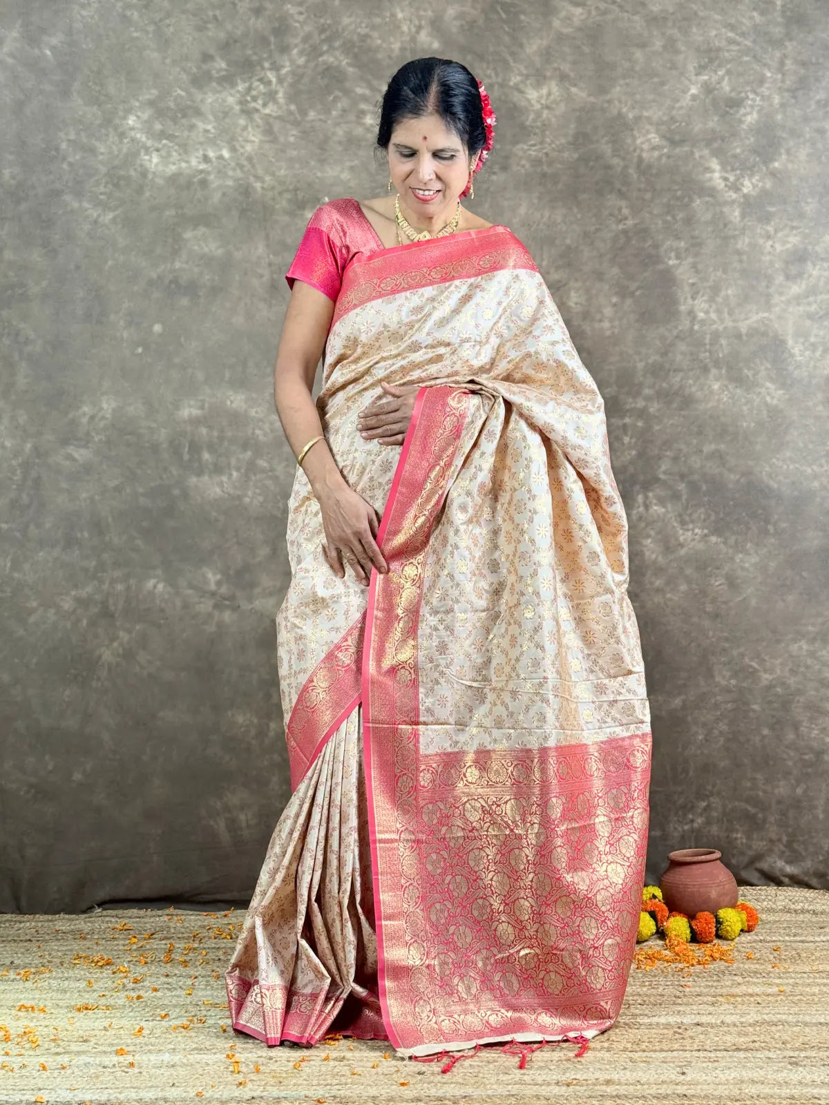 Tarani premium off white silk saree with pink border full view for festive wear