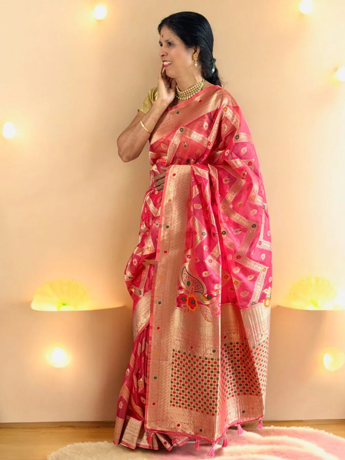 Tarani pink silk saree front view with elegant woven design and festive appeal