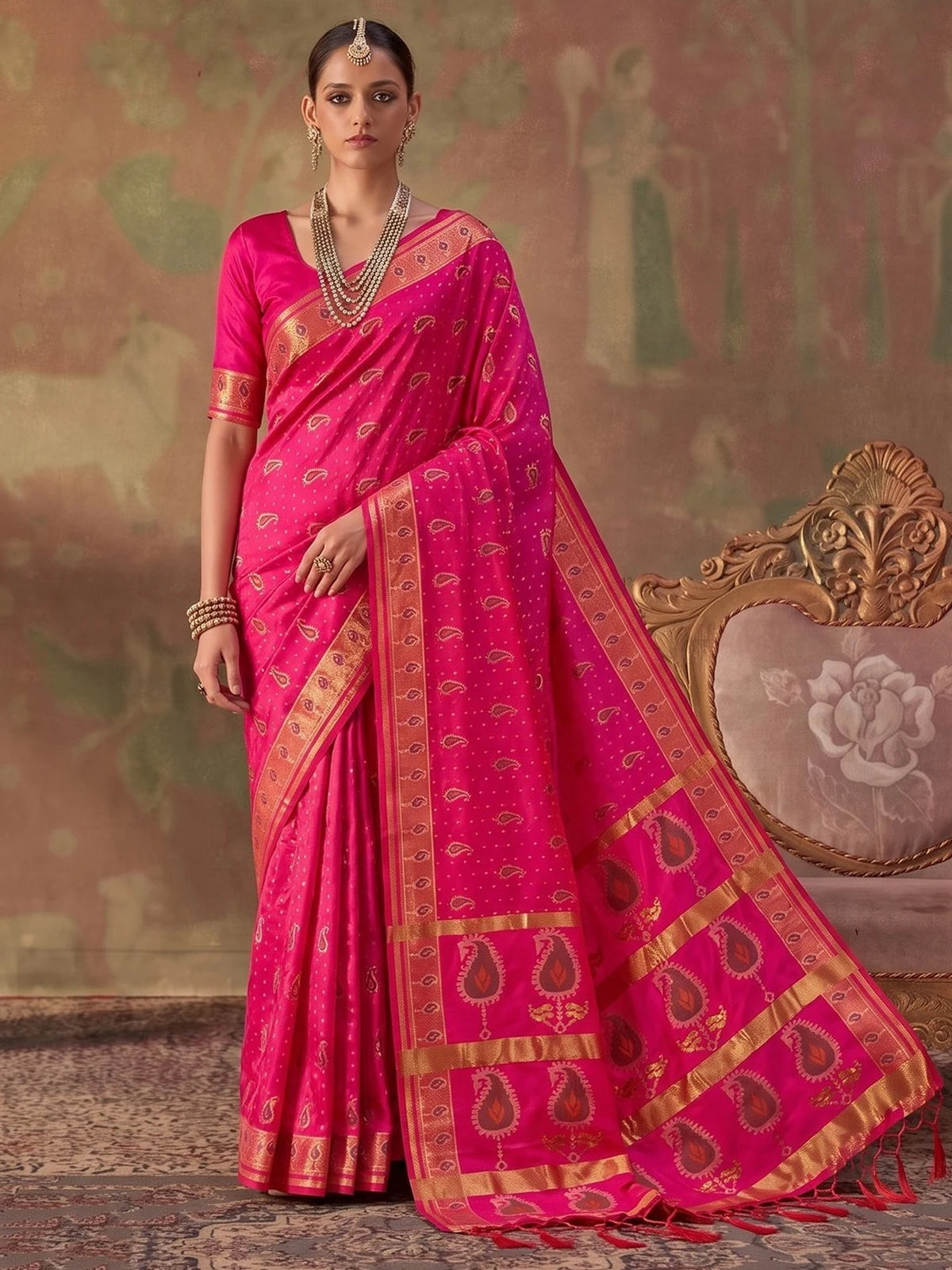 Tarani pink silk zari weaving saree front view with woven border and unstitched blouse