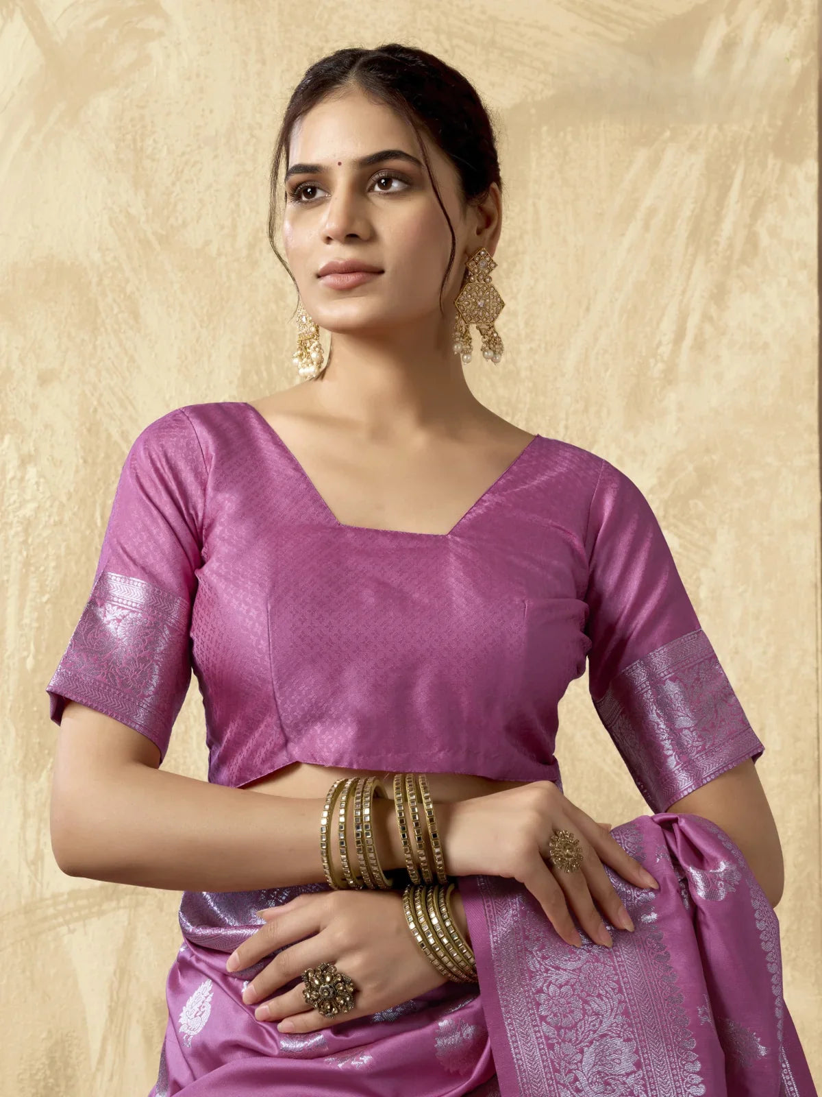 Tarani pink silk saree front view showcasing silver motifs and elegant drape