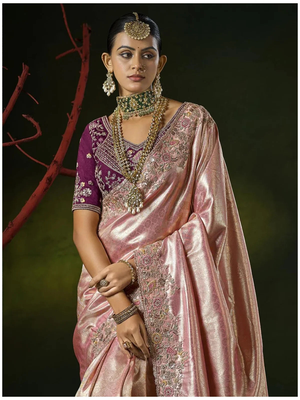 Tarani pink silk saree front close pose Preeti showcasing detailed border and sleeve embroidery bridal wear