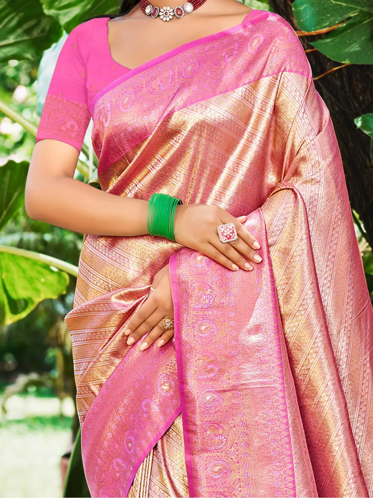 Tarani graceful pink kanjivaram silk saree front view highlighting woven details