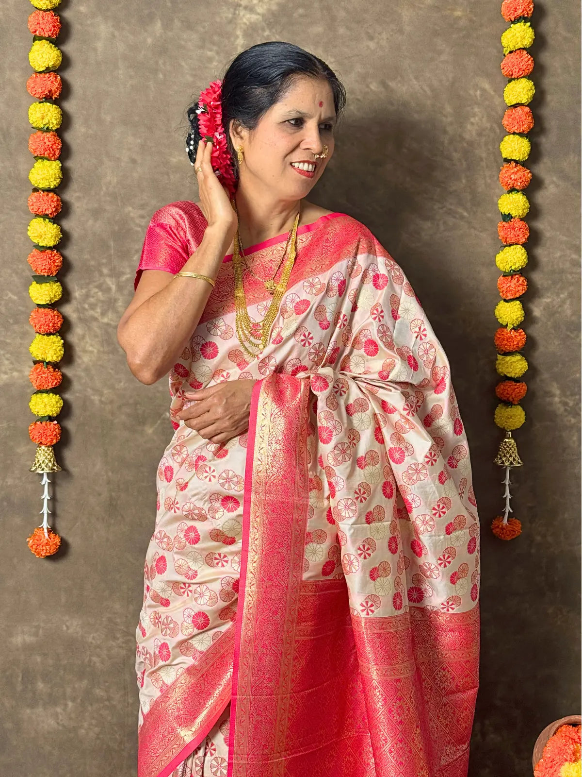Tarani elegant pink woven silk saree upper body view with blouse and jewellery styling
