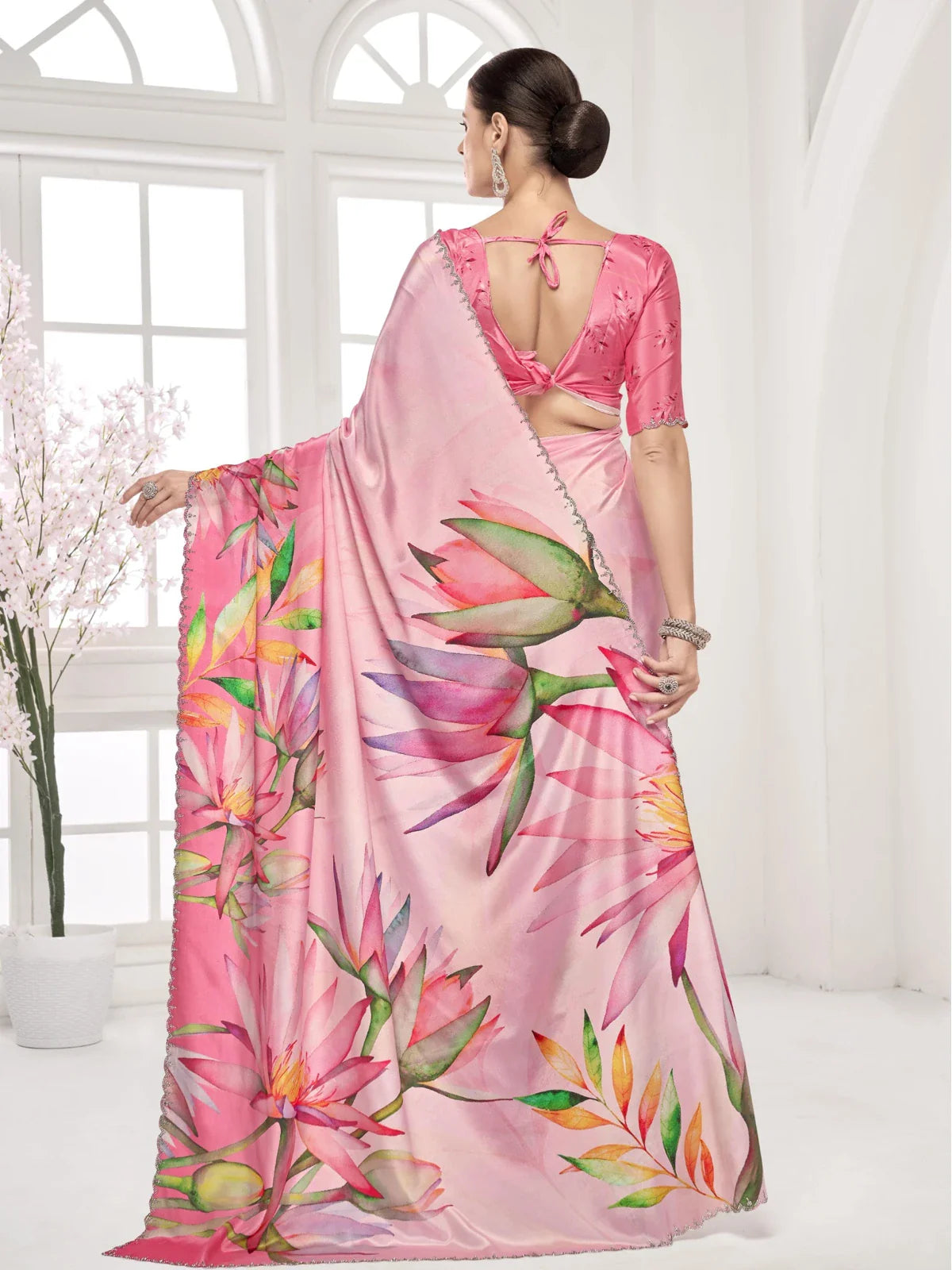 Tarani back view pink party saree with delicate floral palette and modern blouse