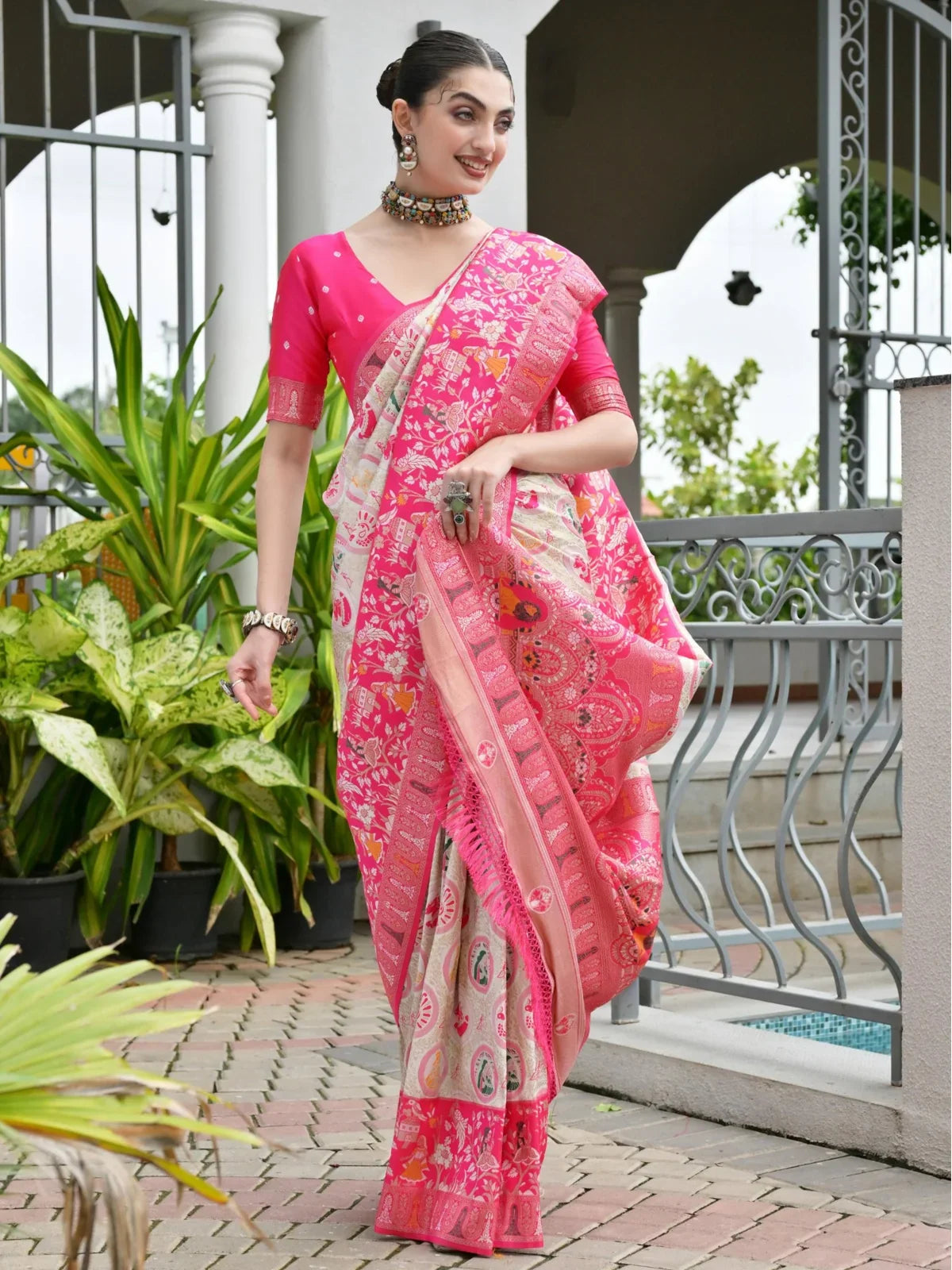 Tarani pink Banarasi Patola silk saree with zari pallu full view and contrast blouse