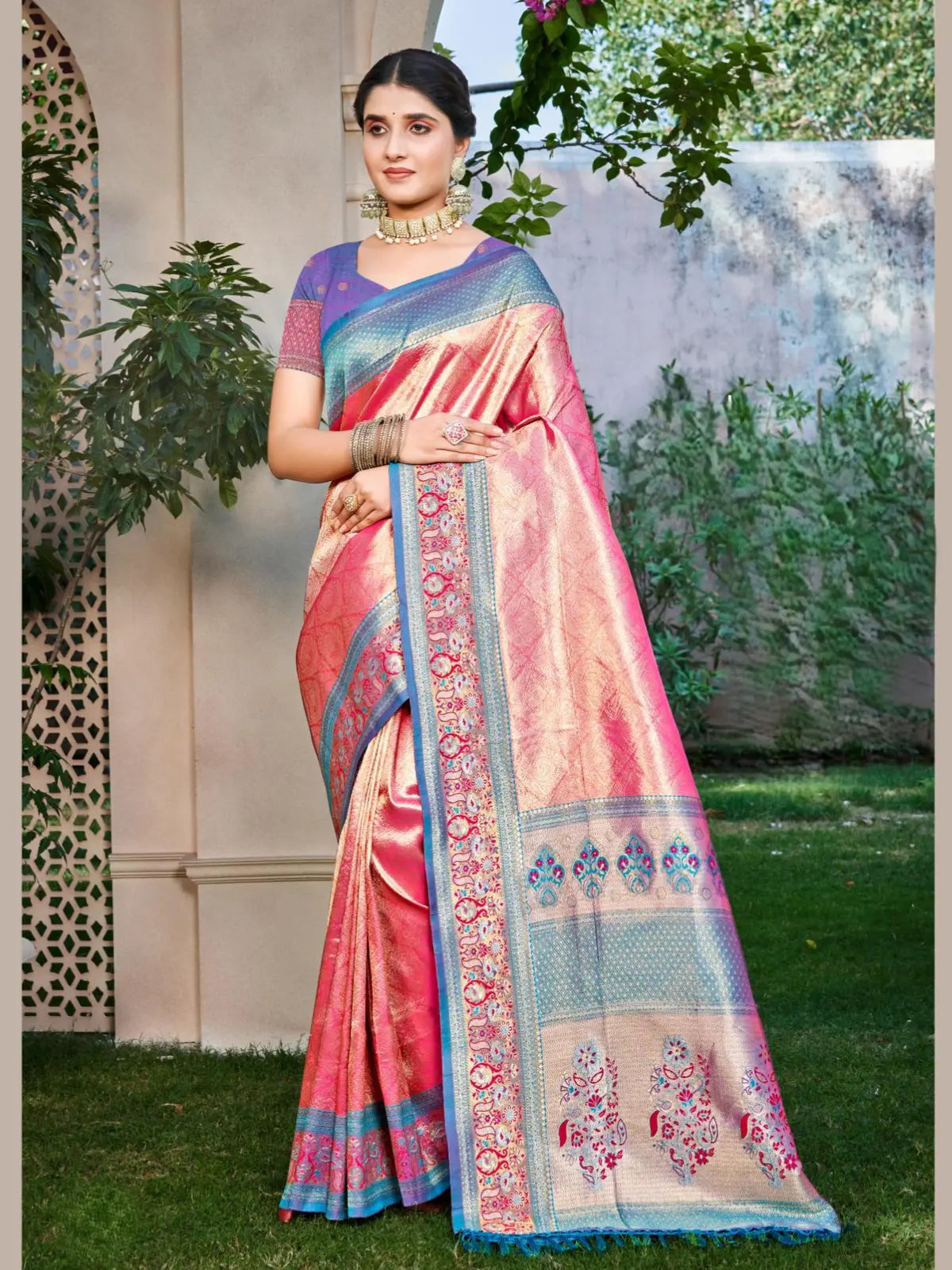 Tarani pink kanjivaram silk saree with golden zari border and elegant festive design