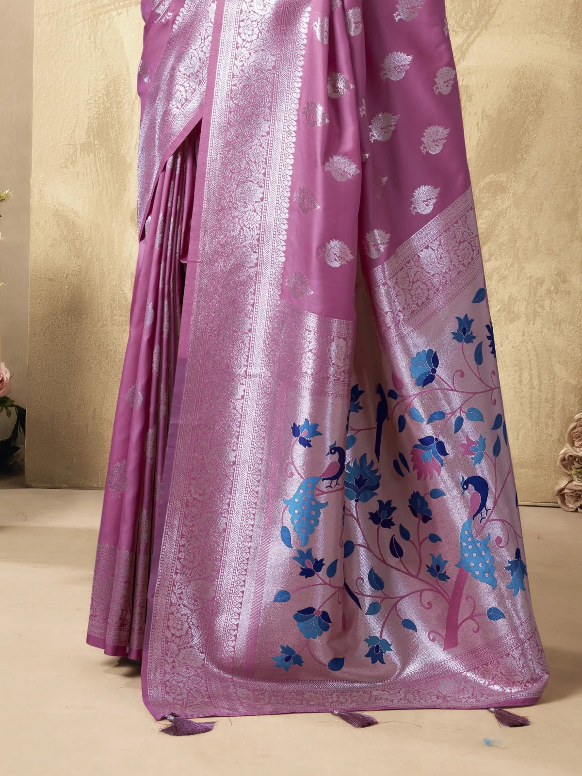 Tarani pink silk saree pallu view with detailed peacock and floral weaving design