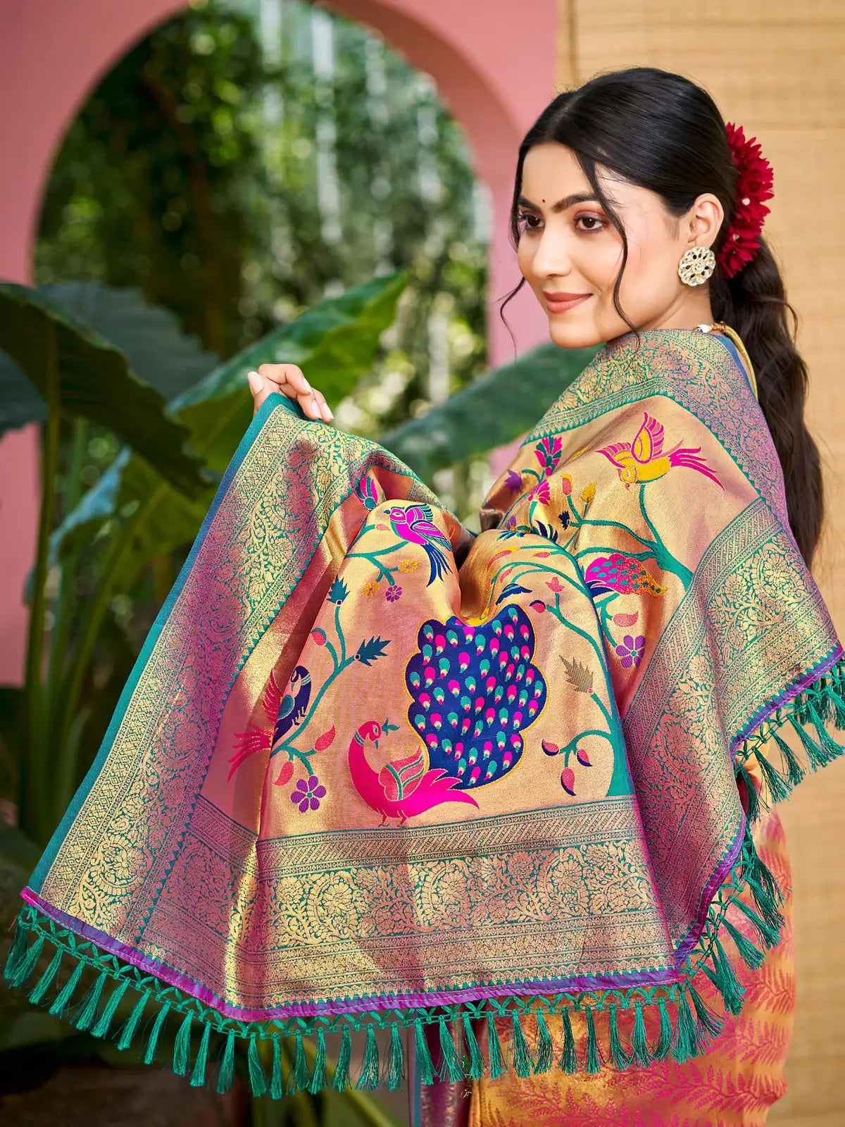 Tarani pink Kanjivaram silk saree pallu with rich zari and peacock motifs