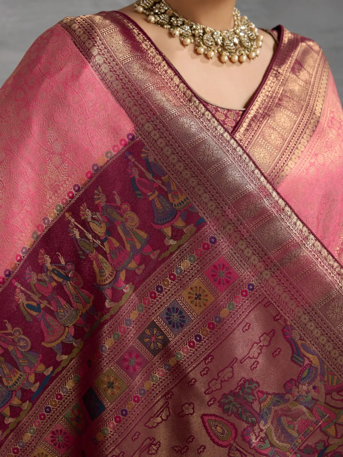 Tarani pink silk saree pallu view with traditional meenakari weaving and zari highlights