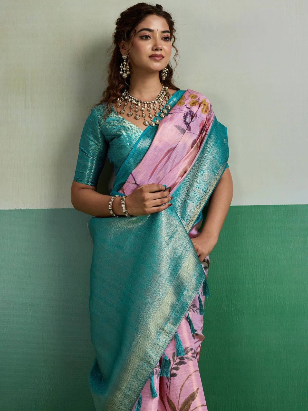 Tarani pink Pure Kanjivaram Tissue Silk saree upper body view with floral print and Barcode Silk blouse