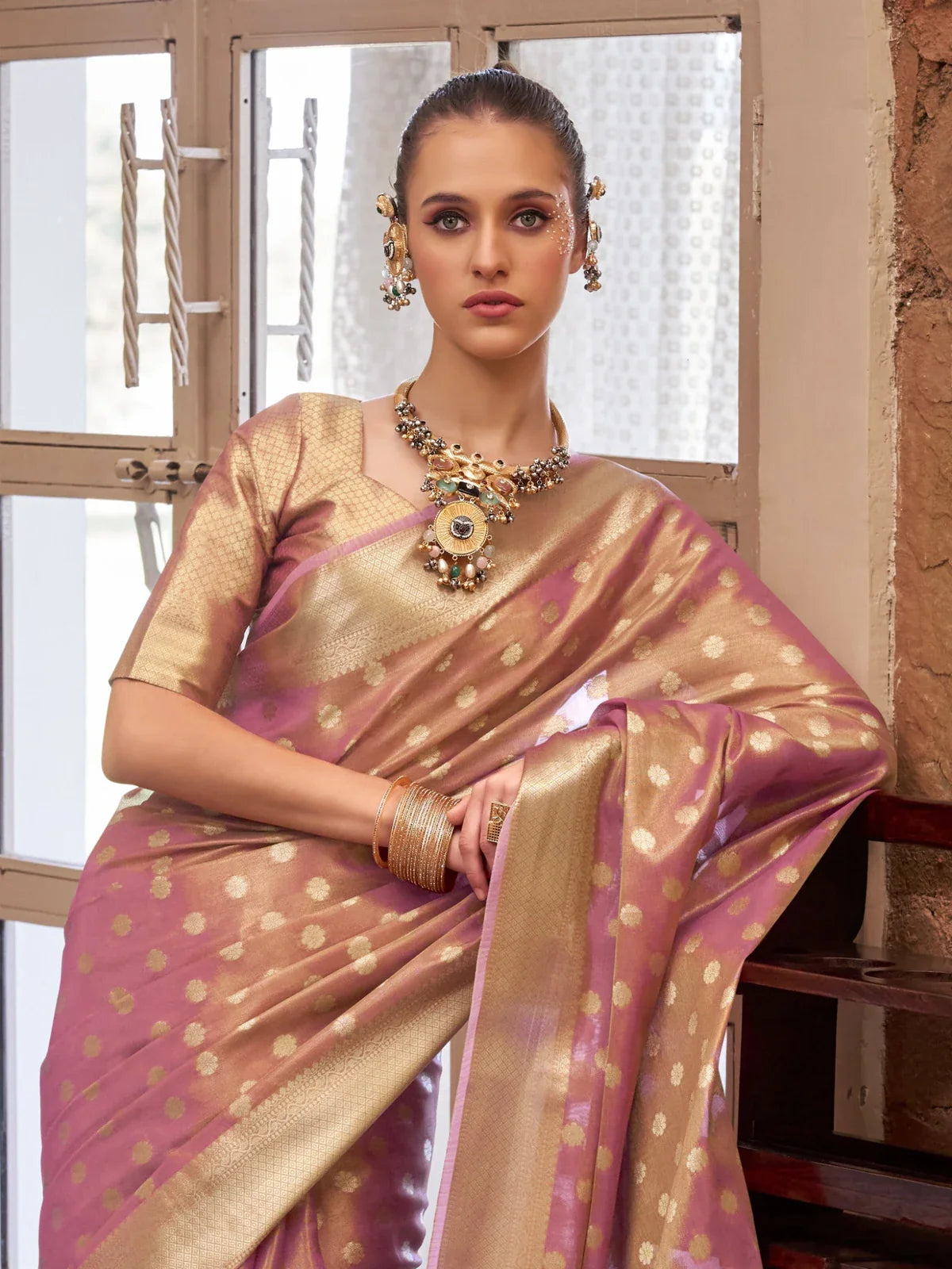 Tarani pink silk saree upper body view with zari butti pattern and tissue silk blouse