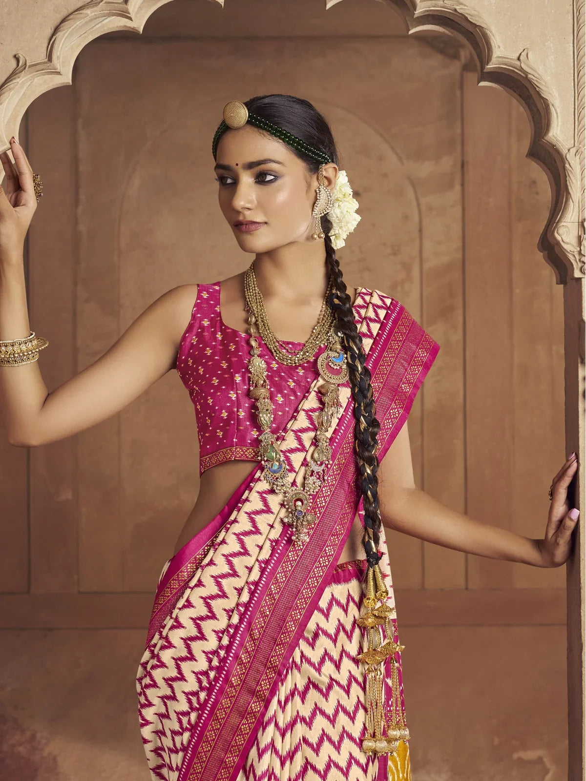 Tarani pink Mercerizer Sigma Silk saree upper body view with blouse and jewelry