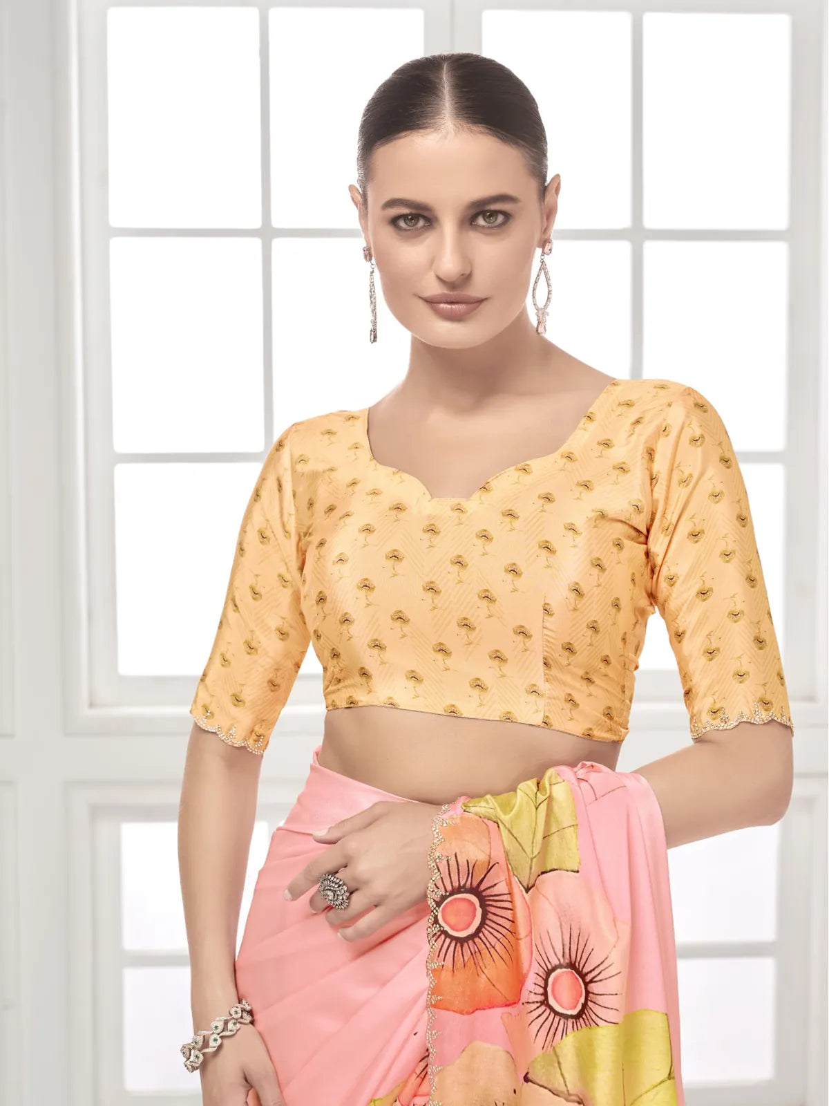Tarani pink silk saree with yellow embroidered designer blouse upper body view