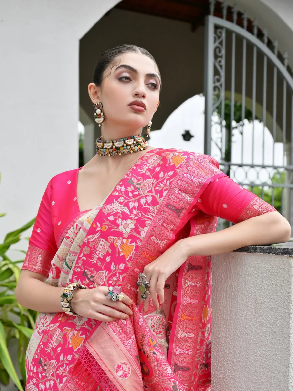 Tarani pink zari silk saree upper body view with ethnic choker and detailed pallu