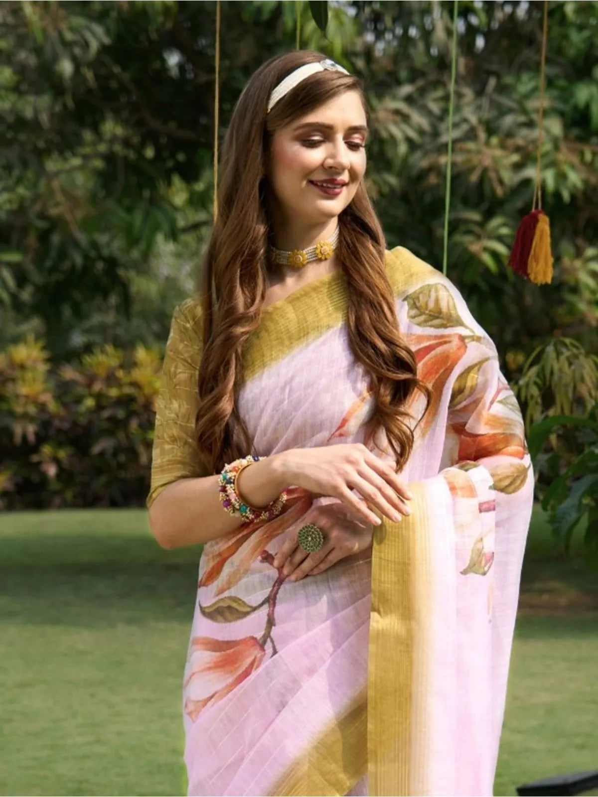 Tarani premium pink silk saree upper body view showing floral pattern and border