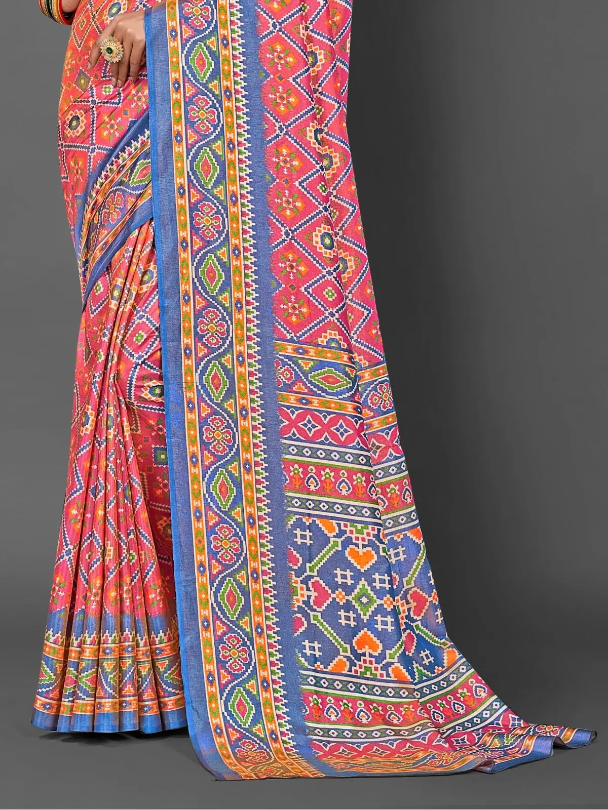 Tarani pink silk saree pallu close-up showing traditional border and motifs