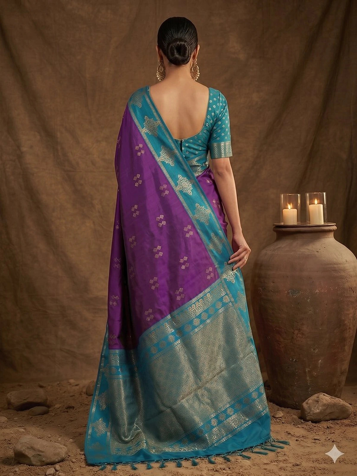 Tarani soft silk saree rear drape view with woven teal zari border by Tarani