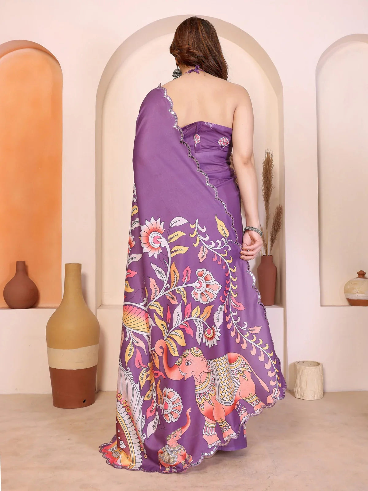 Tarani purple saree back view showing elephant and lotus motifs in kalamkari print