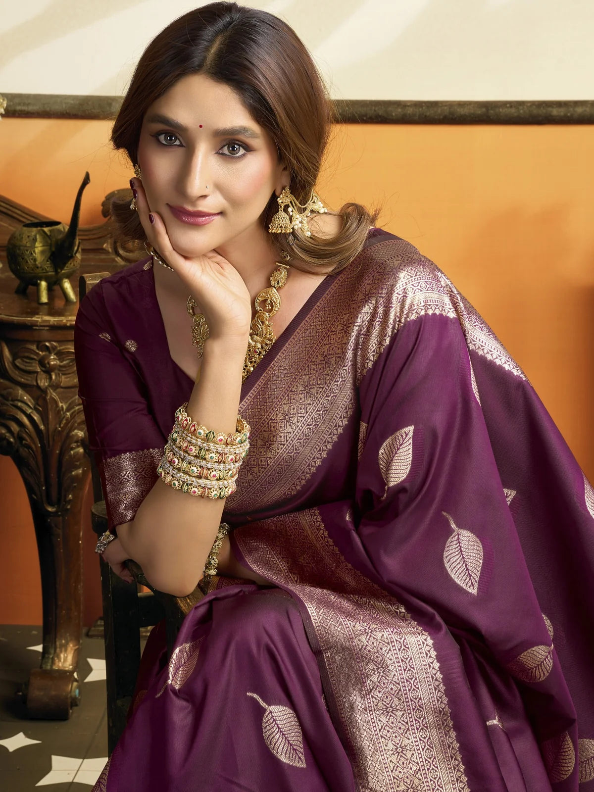 Tarani Hemagi purple premium soft silk saree closeup with woven zari leaf motifs and border