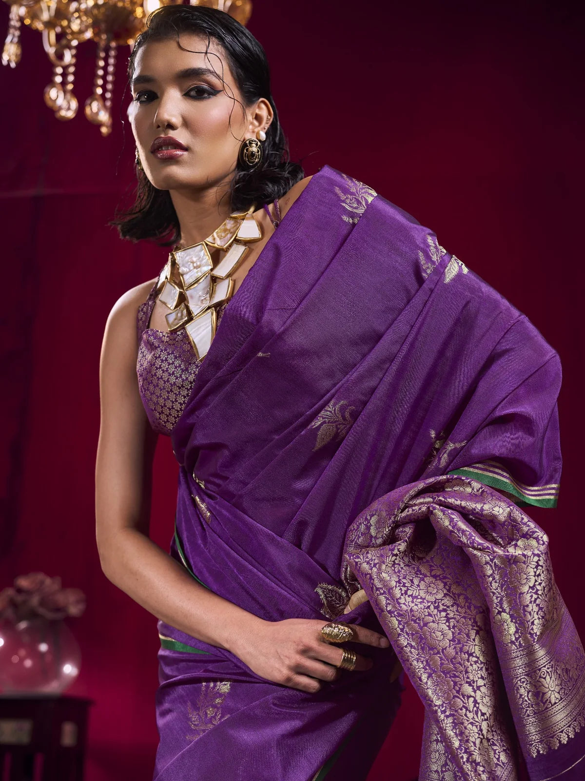 Tarani purple satin linen silk saree closeup view highlighting woven zari detailing and drape