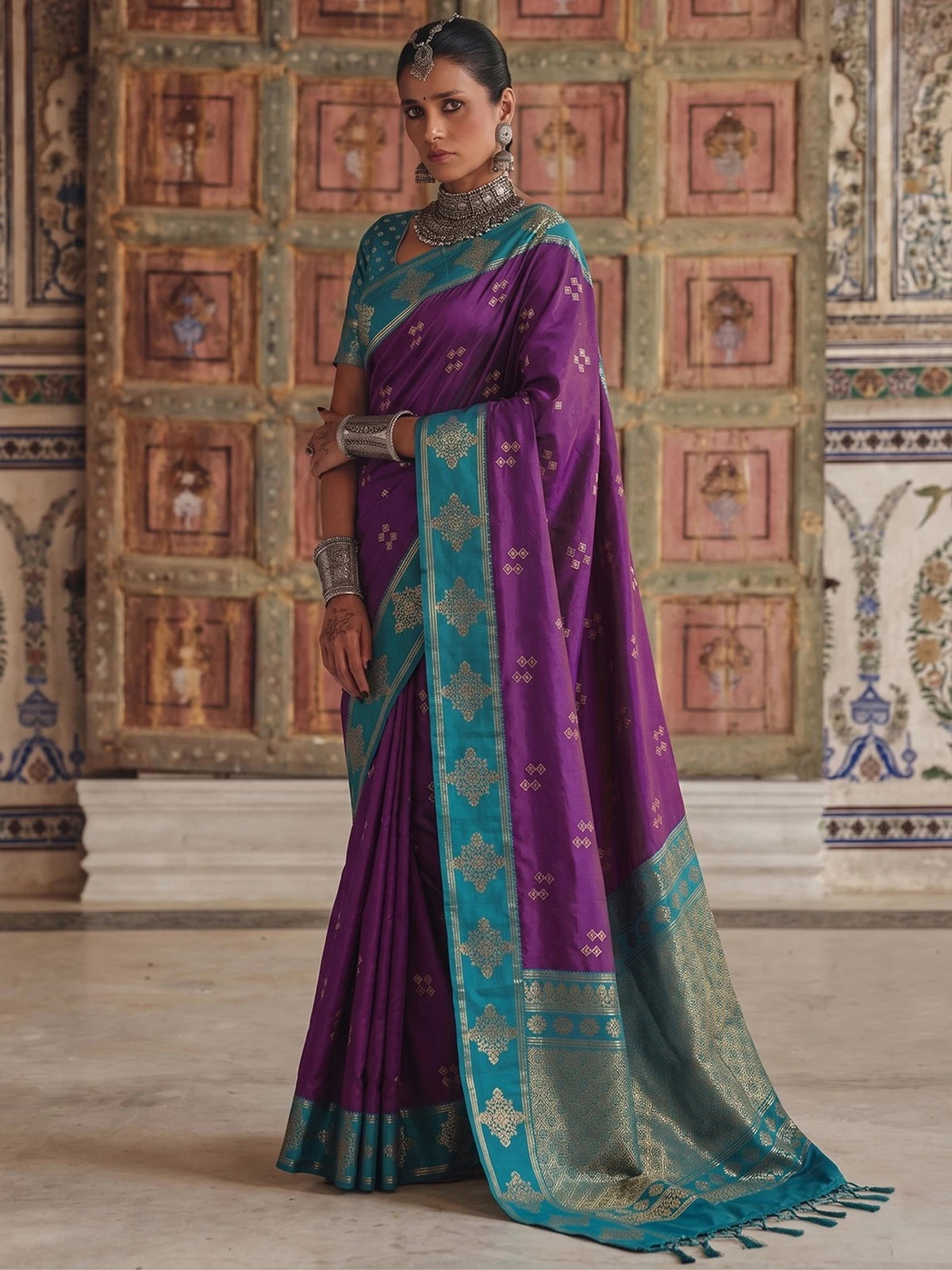 Tarani Kinjal premium soft silk purple saree full front view with teal contrast woven border and pallu