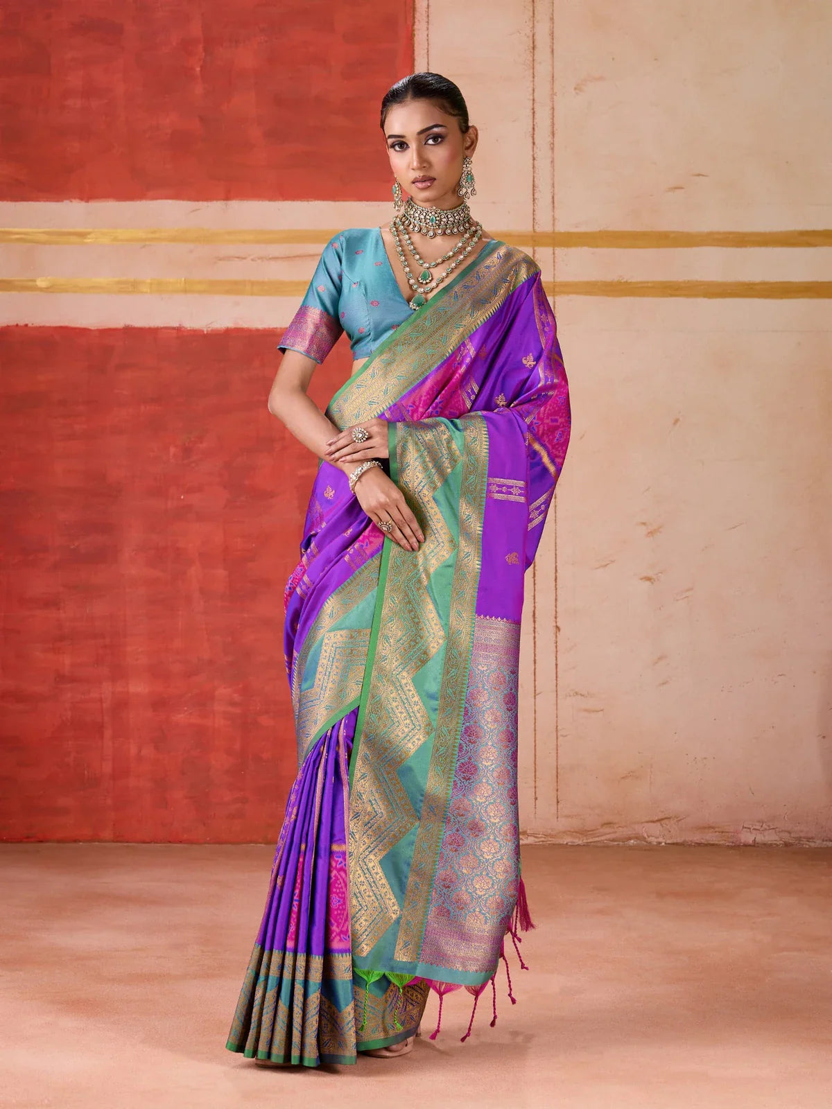Tarani purple pure silk saree with rich handloom weave and green zari border full view worn for festive occasions