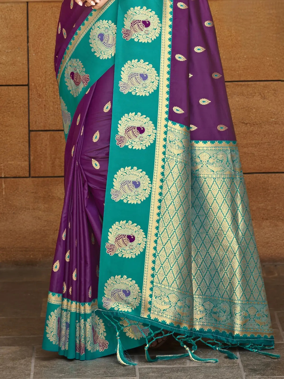 Tarani purple silk saree pallu view with rich zari weaving border and traditional peacock motifs