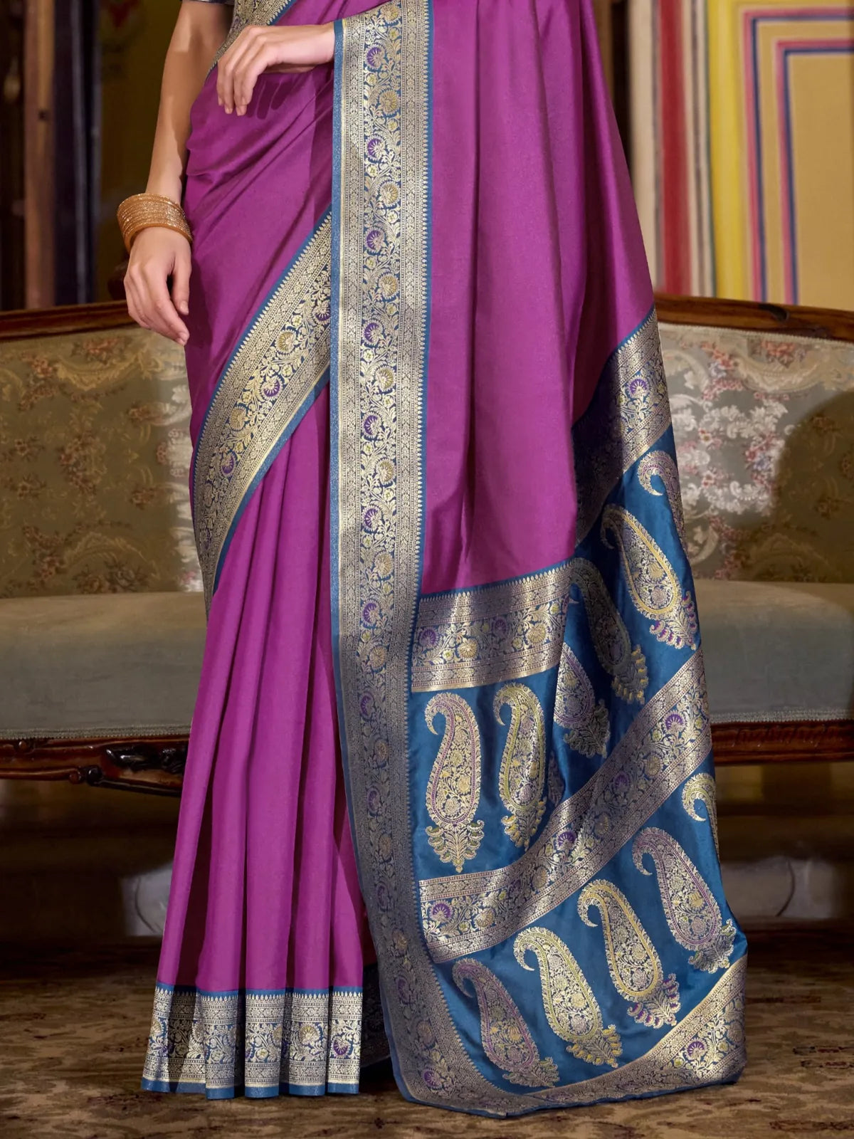 Tarani purple silk saree pallu view with rich golden paisley motifs and weaving details