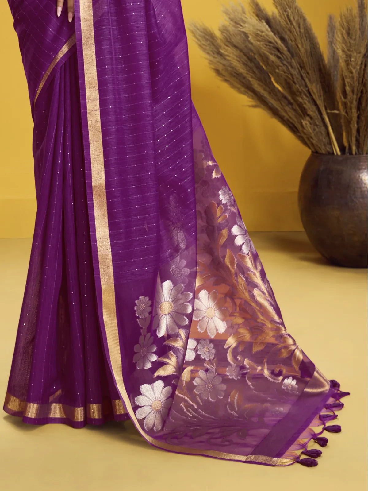 Tarani royal purple silk saree pallu featuring gold floral weaving in detail