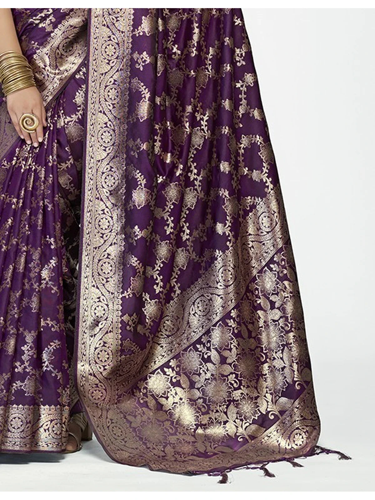 Tarani woven zari pallu in purple silk saree with floral detailing and ornate border