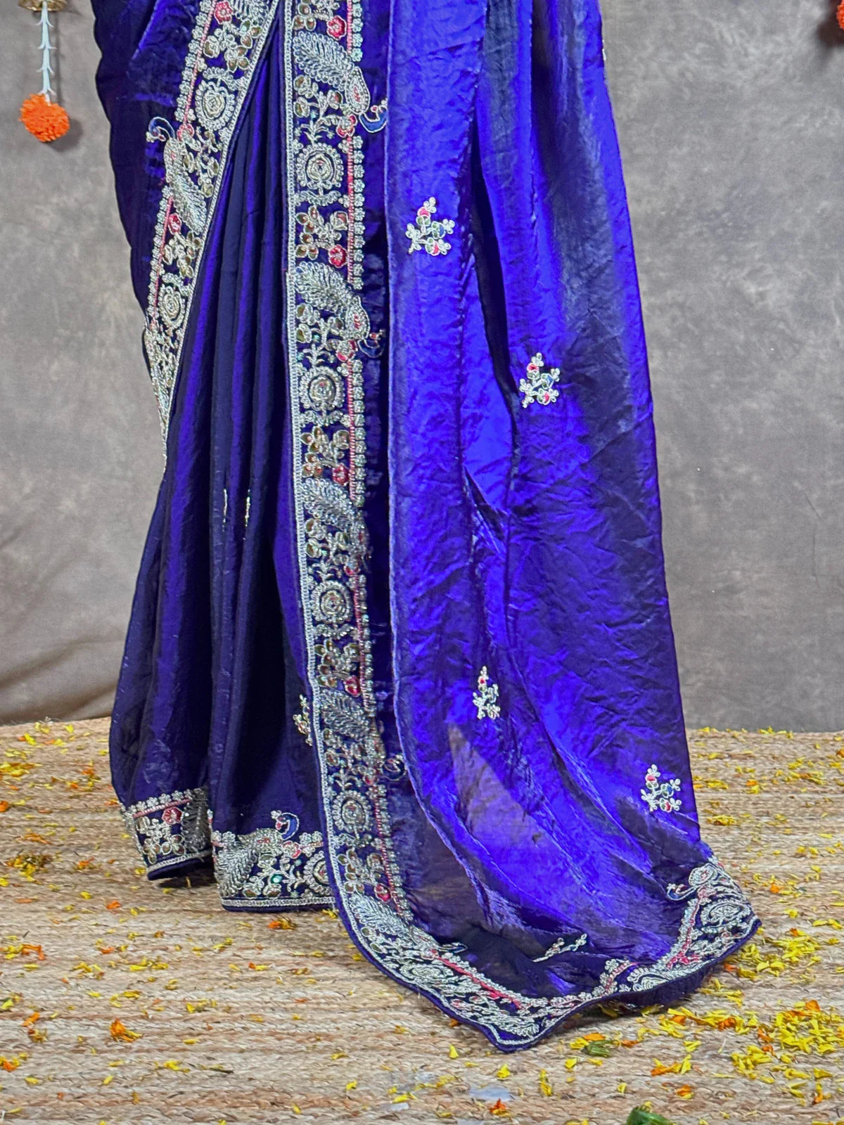 Tarani purple silk saree pallu view with zari and floral embroidery design