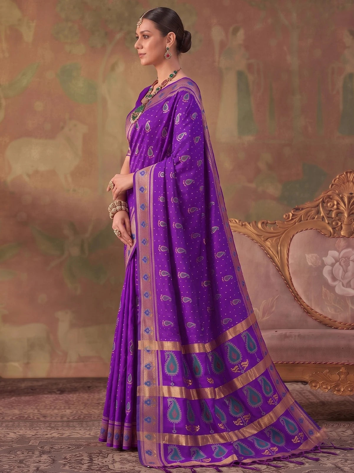 Tarani purple silk saree side view highlighting zari woven border and drape