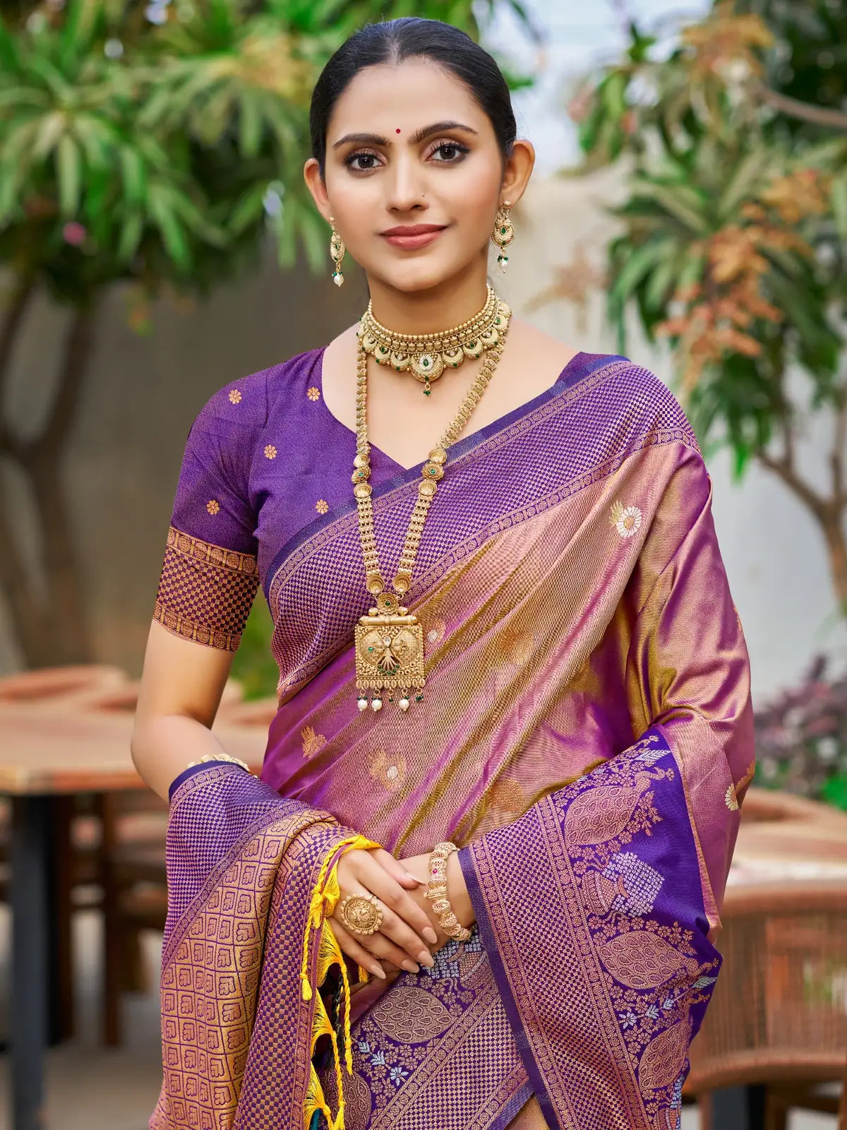 Tarani purple soft silk saree upper body view with woven zari detailing and contrast blouse