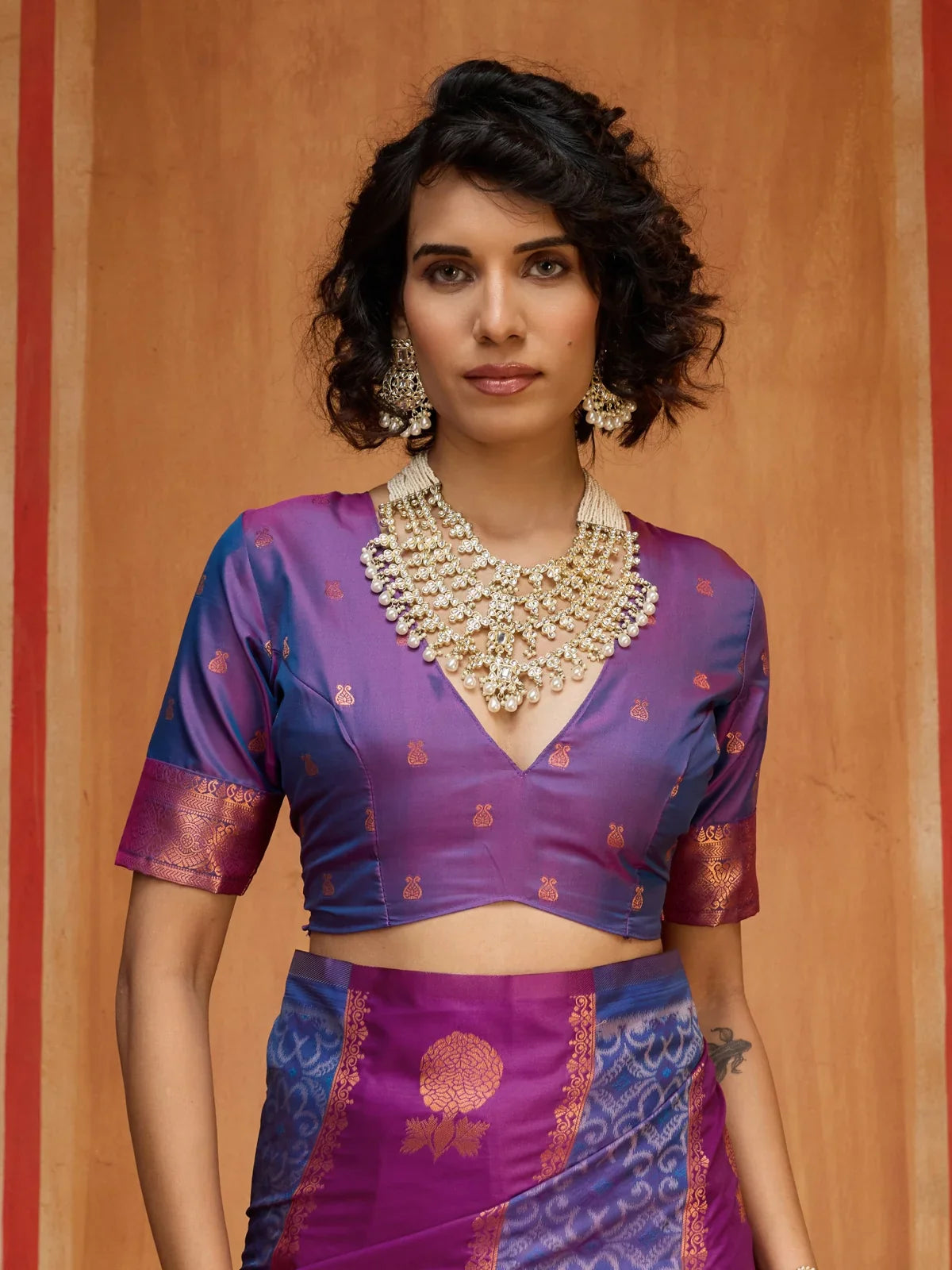 Tarani purple silk saree upper body view with blouse and jewellery styling for festive occasions