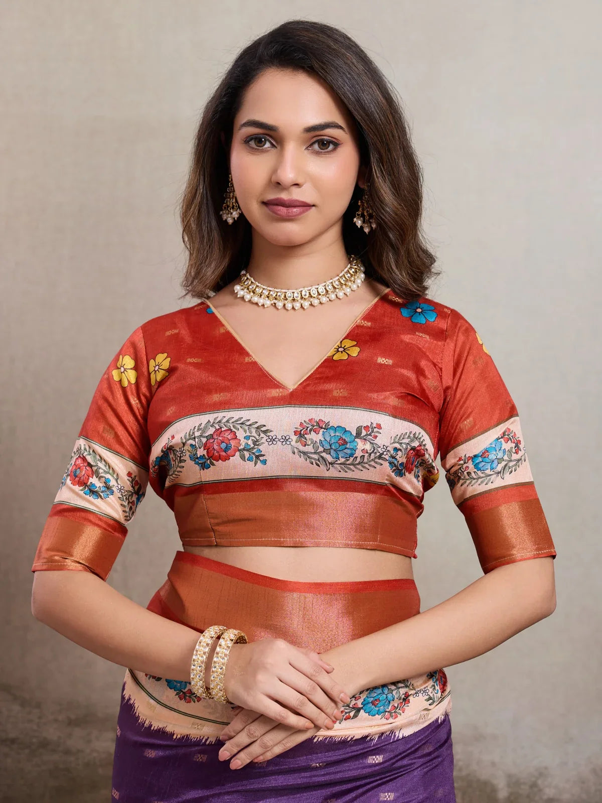 Tarani silk saree upper body view showing blouse and floral border print