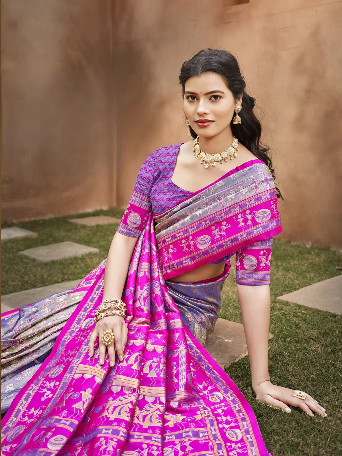 Tarani elegant purple kanjivaram silk saree upper body view with golden motifs