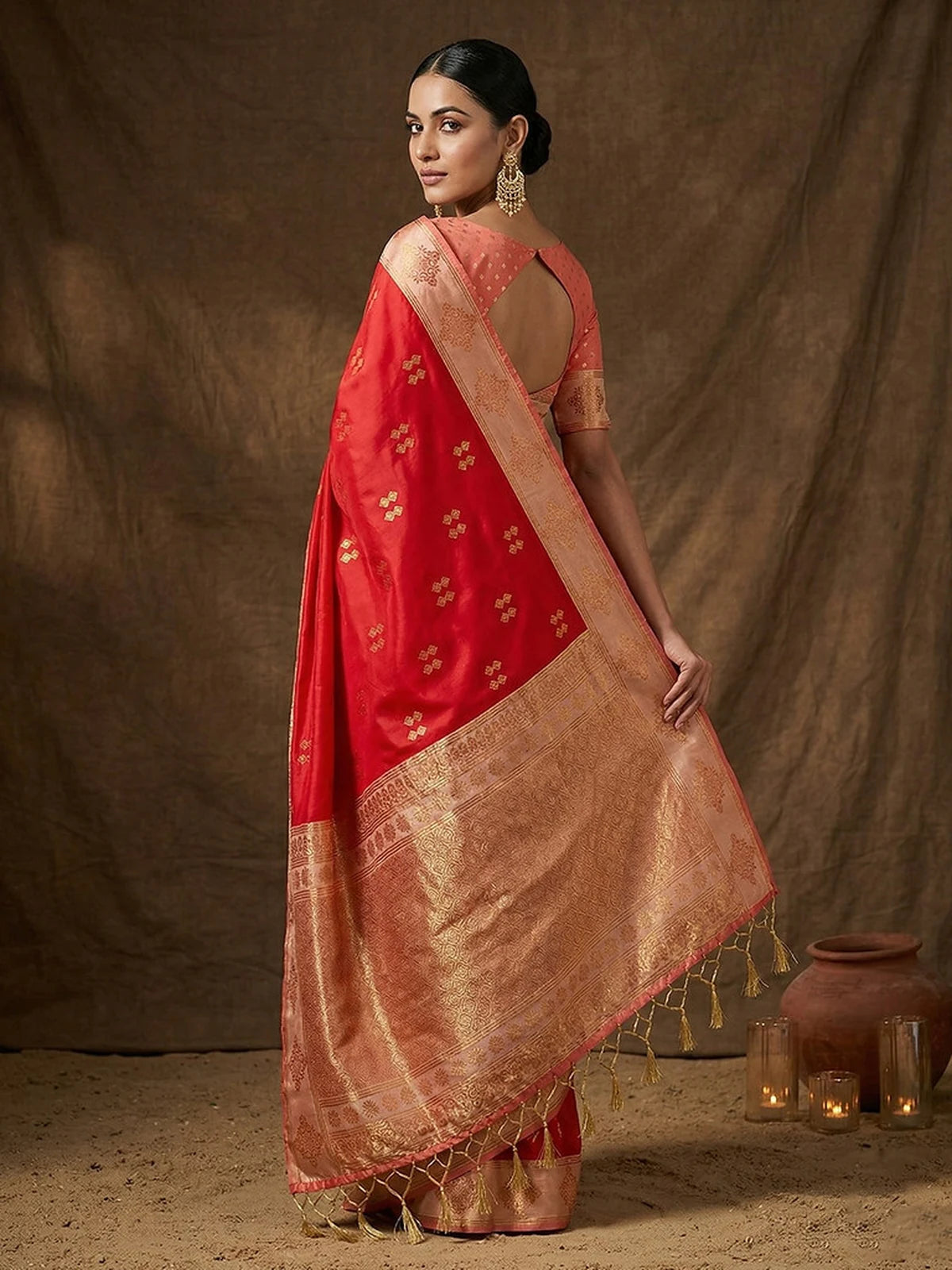 Tarani red soft silk saree back view with zari pallu and woven blouse detailing