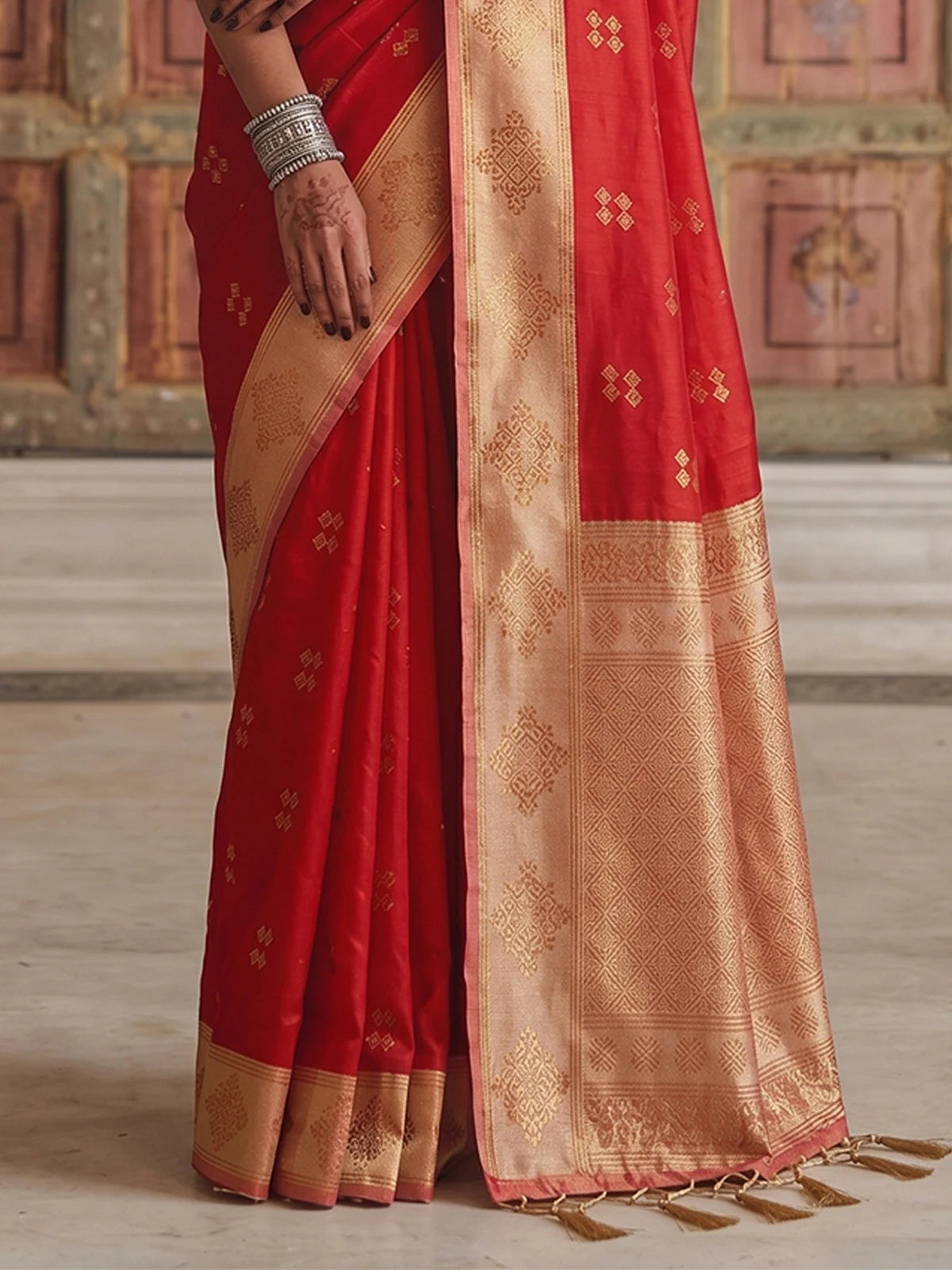 Tarani premium soft silk red saree with contrast woven border closeup view