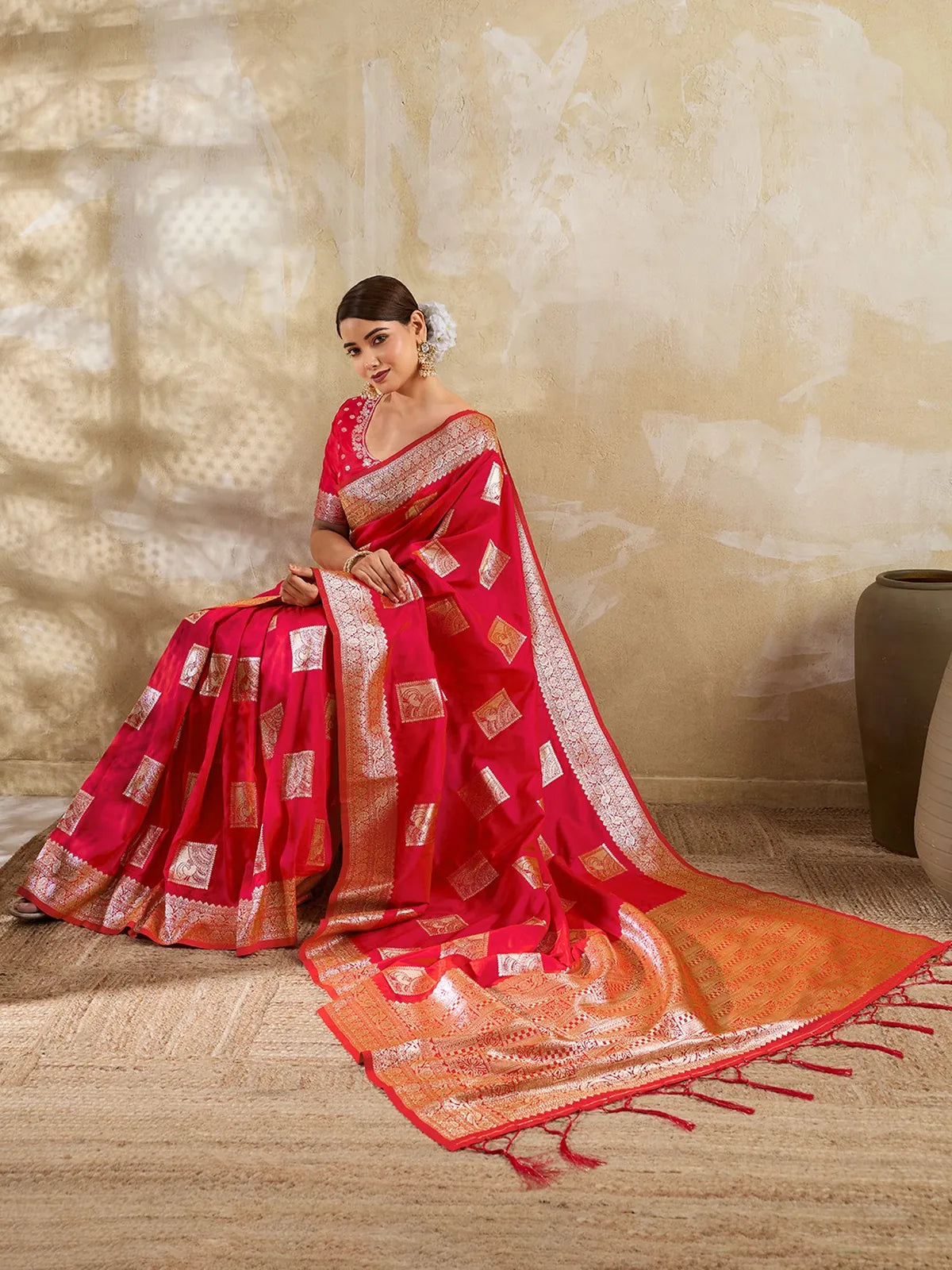 Tarani red silk blend zari work saree front sitting pose for festive wear