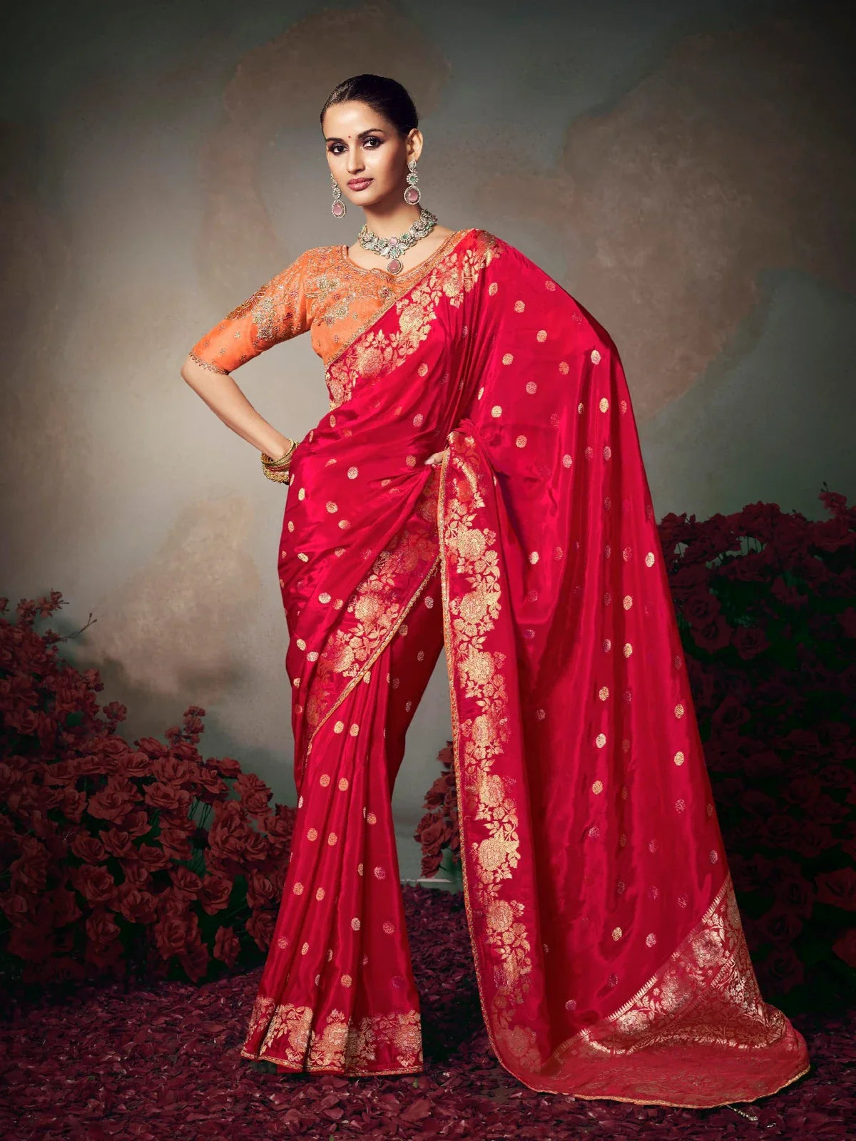 Tarani red silk saree with zari floral motifs and designer embroidered blouse perfect for party and festive wear