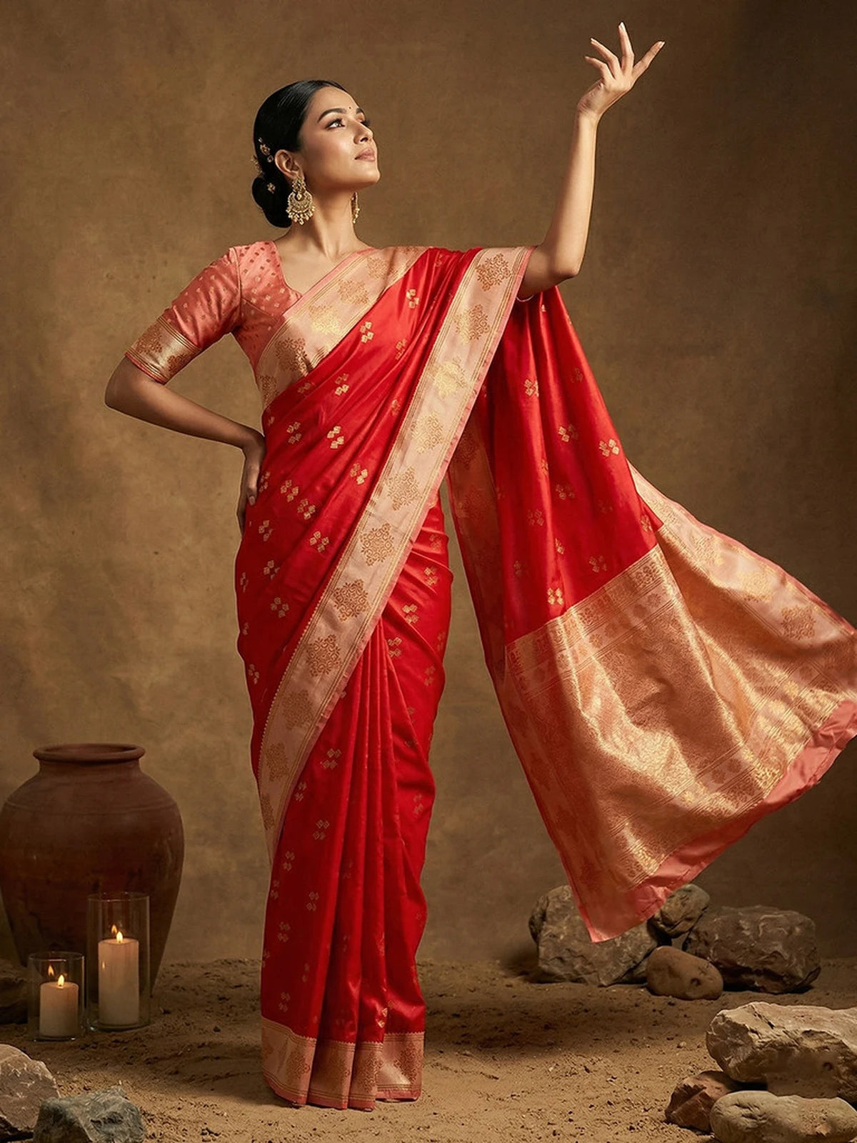 Tarani red soft silk saree with rich zari pallu and elegant festive drape side pose
