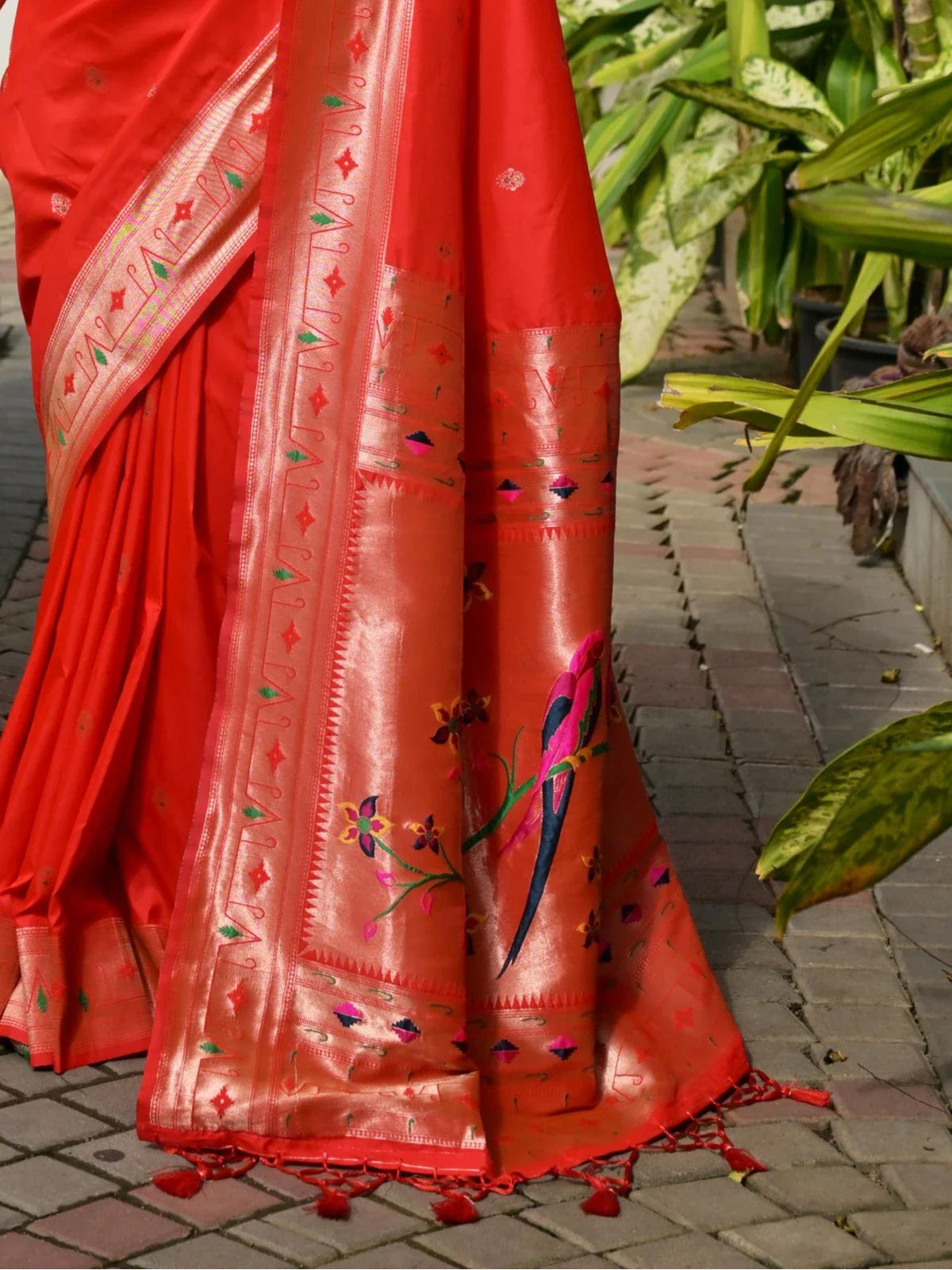 Tarani rich zari and meena pallu in red silk with parrot motifs and tassel border - pallu closeup