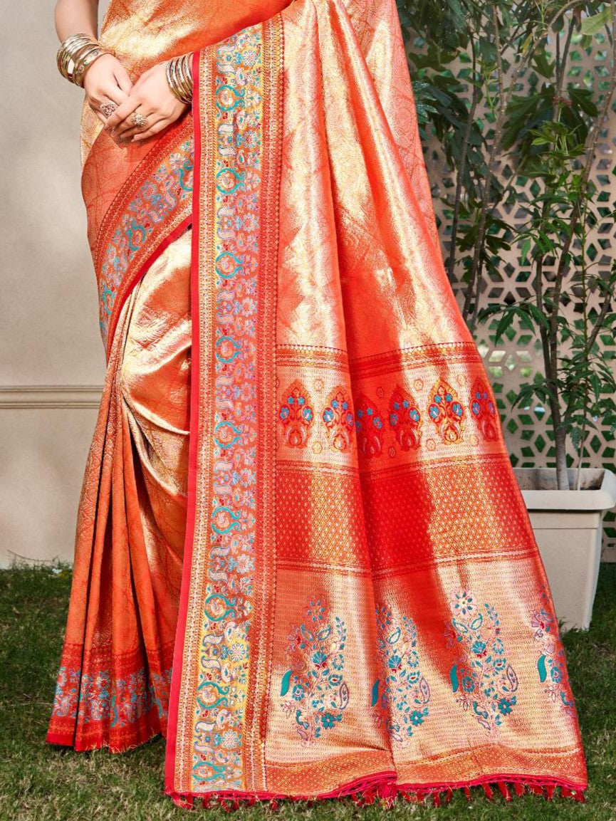 Tarani red Kanjivaram silk saree pallu view showcasing golden zari work