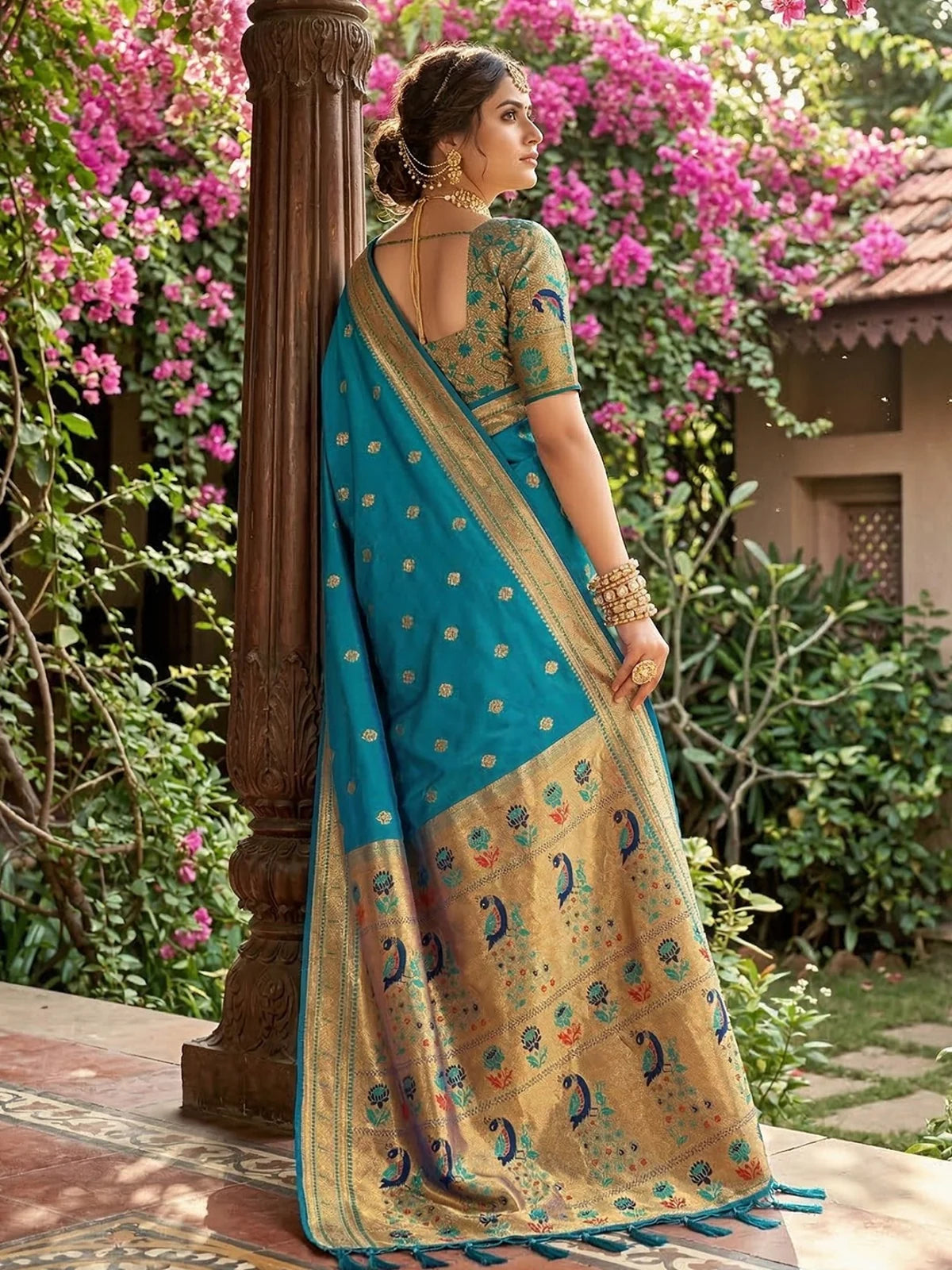 Tarani Swarada teal soft silk saree back view showcasing blouse design