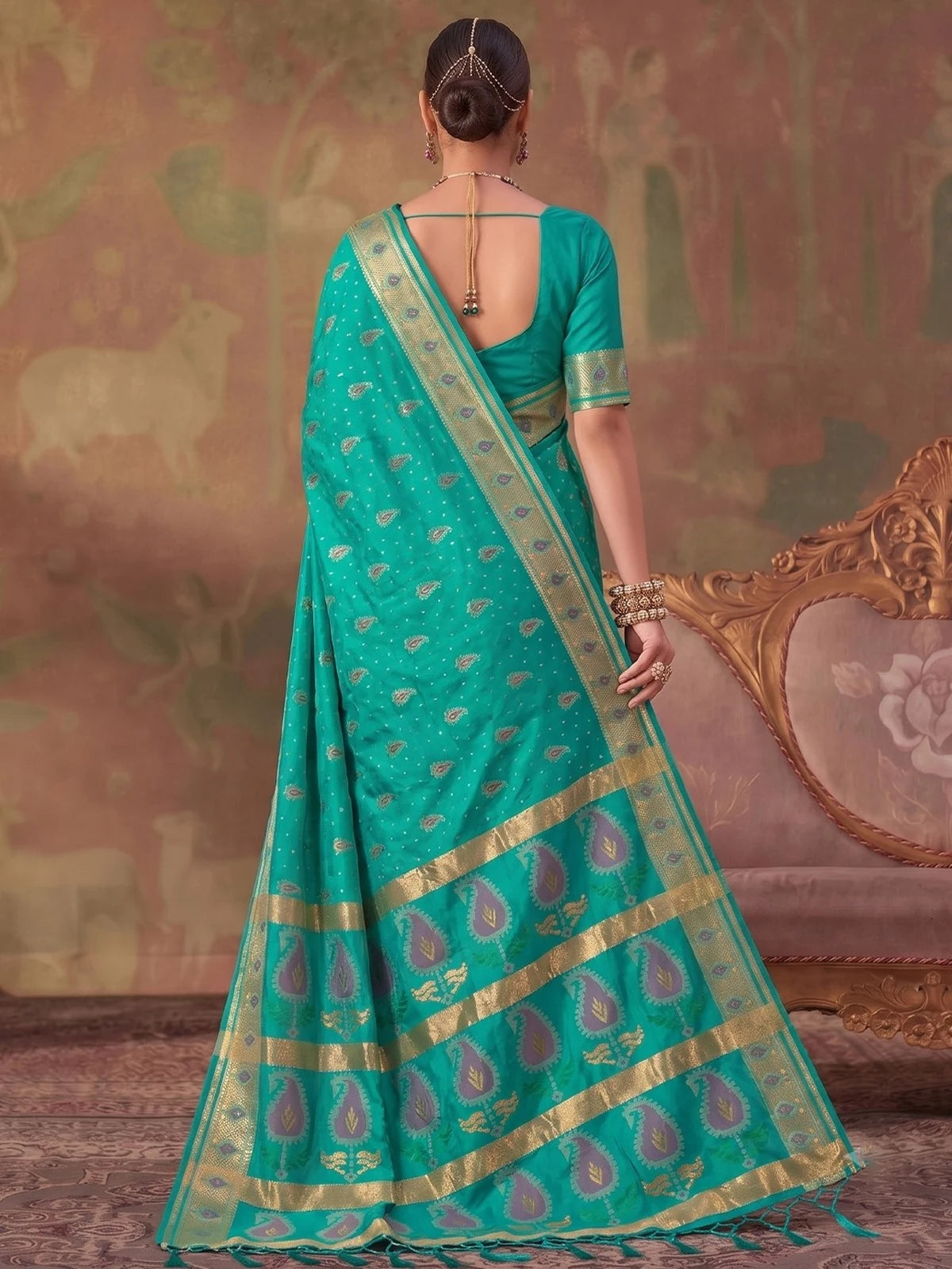 Tarani teal silk saree with zari weaving full back view showing pallu design